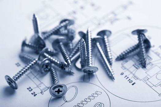 metal screws over technical drawing