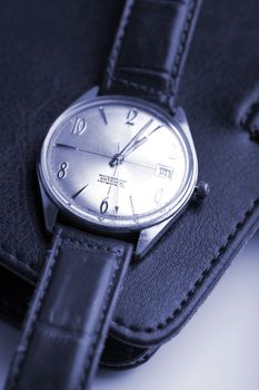 leather organizer and watch (shallow DOF)