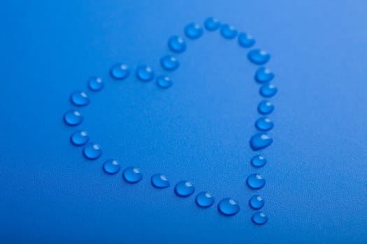 blue heart shape of water droplets