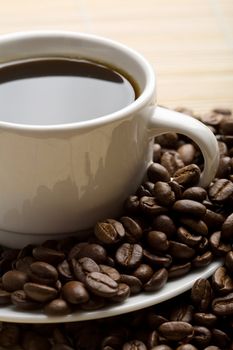 cup of coffee and coffee beans