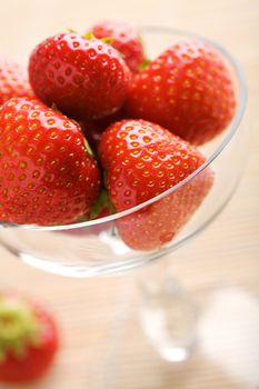 ripe strawberries in glass bowl