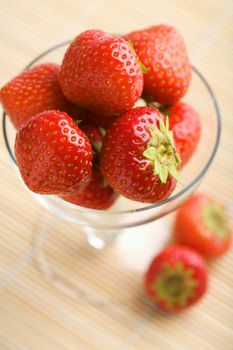 ripe strawberries in glass bowl