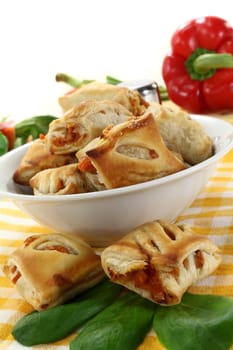 savory pastry snacks filled with red pepper and vegetables