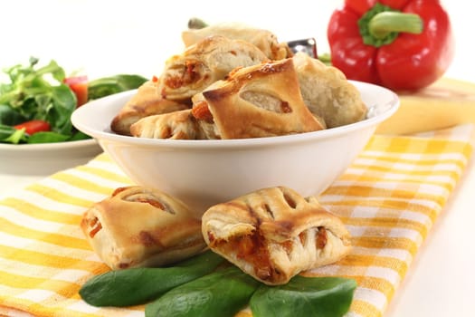 savory pastry snacks filled with red pepper and vegetables