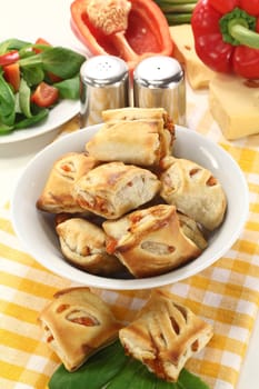 savory pastry snacks filled with red pepper and vegetables