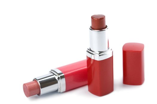 two open lipstics isolated