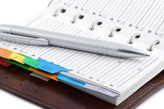 pocket planner and pen isolated