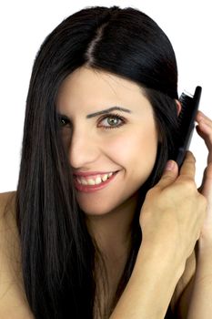 Beautiful woman with green eyes hold brush smiling