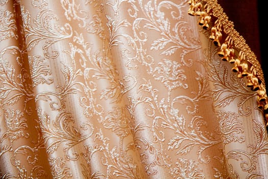 curtain with tassels and embroidered in retro style