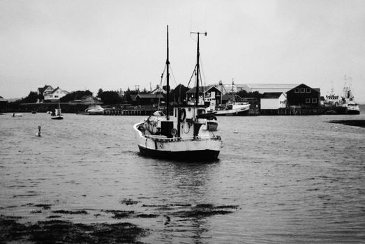 A fishing boat in a small fishing community in Nordland County, in the north of Norway.