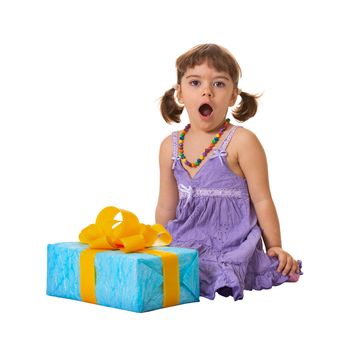 The little girl in deep shock from a large gift
