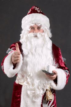 An image of Santa Claus showing thumb