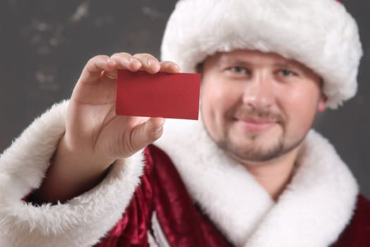 Santa Claus showing a red card