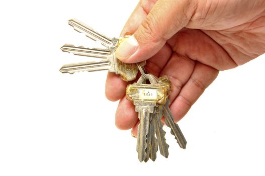 human hand with keys on white 