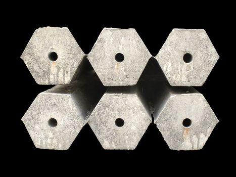 Hexagon concrete pillar on black background with clipping path