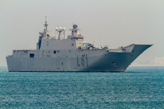 CADIZ, SPAIN-JUN 01: Aircraft carrier L-61 Juan Carlos I docking to take part in an exhibition on the day of the spanish army forces on Jun 01, 2012, in Cadiz, Spain