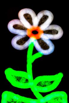 Composition of a flower made by blurred lights