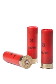 shotgun cartridges isolated over white
