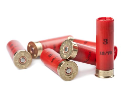 shotgun cartridges isolated over white
