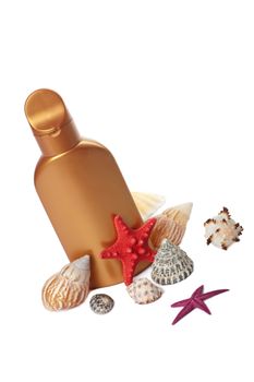 suntan lotion and sea shells isolated

