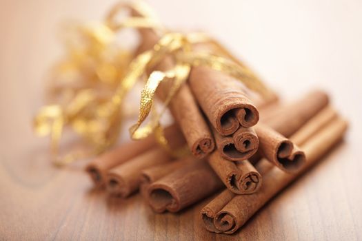 cinnamon with golden ribbon
