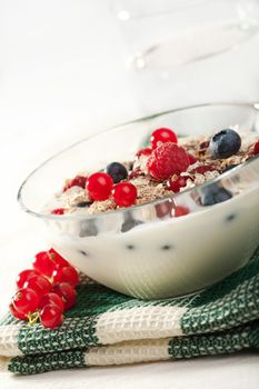 yogurt with cereal and wild berries

