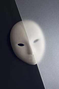 plaster mask in studio, when compared to the good or bad.