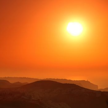 Summer landscape in mountains with the sun