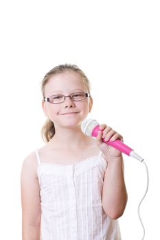 preteen girl with pink microphone isolated on white