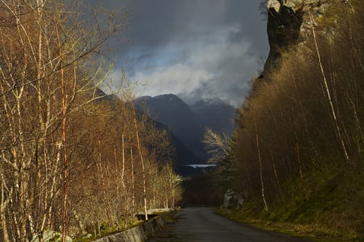 rural landscape with dramatic lighting in norway, europe