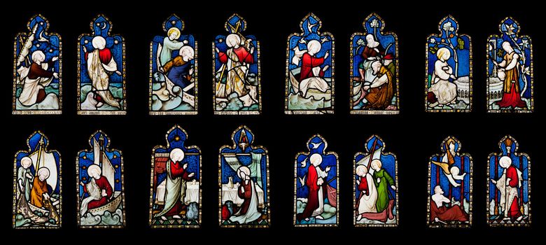 collection of 16 religious stained glass windows in Gloucester Cathedral, England (United Kingdom) (isolated on black background)