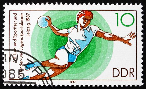 GDR - CIRCA 1987: a stamp printed in GDR shows Handball, 11th Children�s and Youths� Spartakiade, circa 1987