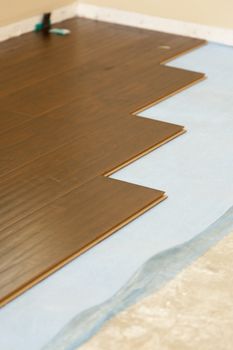 Newly Installed Brown Laminate Flooring Abstract.