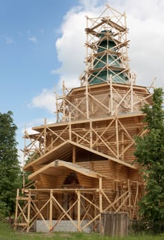 Construction of a wooden church in the village. Russia