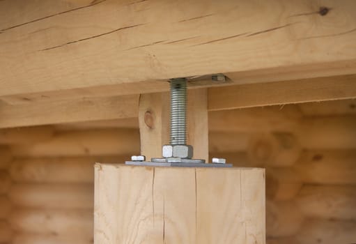 Metal part in the construction of wood