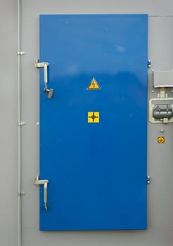 The locked door of the transformer substation