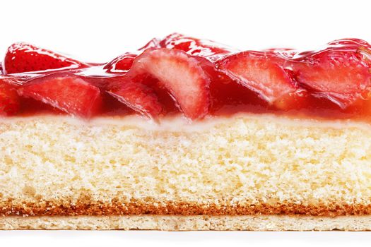 closeup of a strawberry cake from side on white background