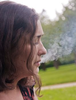 cigarette smoke, young woman dying of cigarette smoke