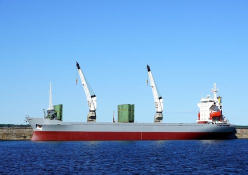 The cargo ship costs at a mooring