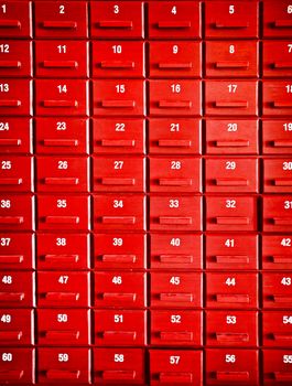 Numbered red wooden cases in the interior of Chinese temple