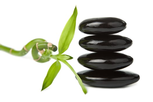 black spa stones and leaves isolated
