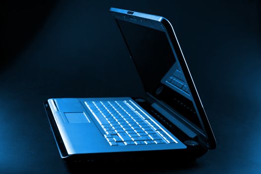 notebook over black background
