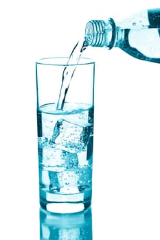 water pouring into glass isolated