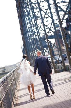 wedding couple walking 