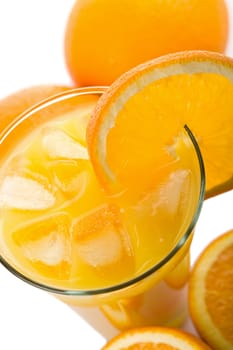 glass of orange juice and oranges isolated
