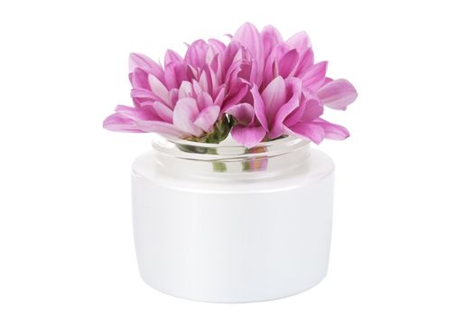 flowers in cosmetic bottle isolated