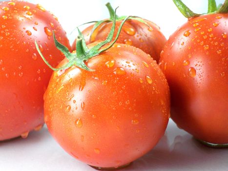 Fresh Red tomatoes isolated on white background