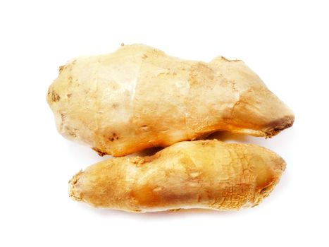 Fresh Ginger root on a white background