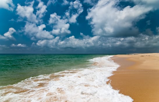 Deserted beach on the island. Faro. Spain.