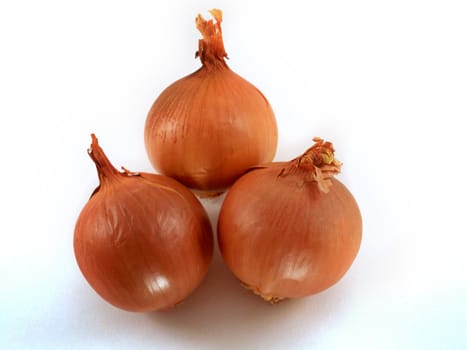 Fresh bulbs of orange onion vegetable on a white background